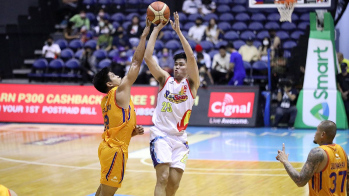 sports rain pic and caption Santi Santillan sparks the E-Painters' hot start. SPIN.PH, PBA IMAGES