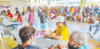 Pandan local government’s Municipal Social Welfare and Development Office distributes the conditional cash grants for the Pantawid Pamilyang Pilipino Program beneficiaries at the town’s Liberman Sports Complex in Barangay Centro Norte on August 12, 2022. MAYOR'S OFFICE - PANDAN, ANTIQUE