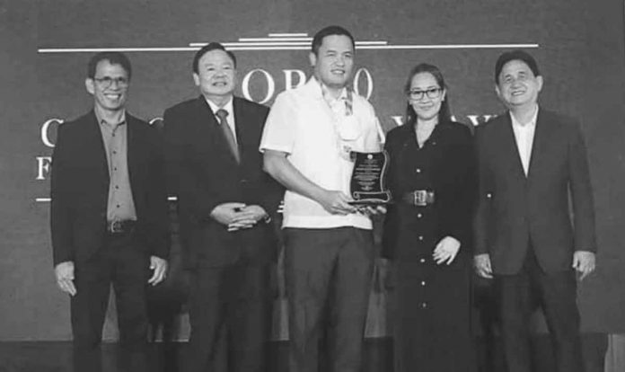 City-gov’t-awards TOP TAXPAYER. Representatives from Panay Energy Development Corporation (PEDC) headed by its First Vice President-Panay Site Head, Atty. Antonio J. Cabalhug Jr., receive a plaque of recognition during the awarding ceremony for top taxpayers in Iloilo City. PEDC topped both in the real property tax and business under Corporation category. JERRY TREÑAS/FB