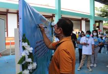 Michael S. Guanco, MGEN – GBP Community Relations Officer, signs the Pledge of Commitment in support of Brigada Eskwela 2022.