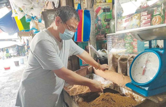 front-ime-sugar-retailers Iloilo Central Market vendor Jose Jocon has temporarily stopped selling refined or white sugar. He says his customers no longer buy refined sugar because it has become expensive. Jocson currently sells just brown sugar. A shortage in the supply of refined sugar is being blamed for the increase in its price in the markets. ARNEL JOHN PALCULLO/PN