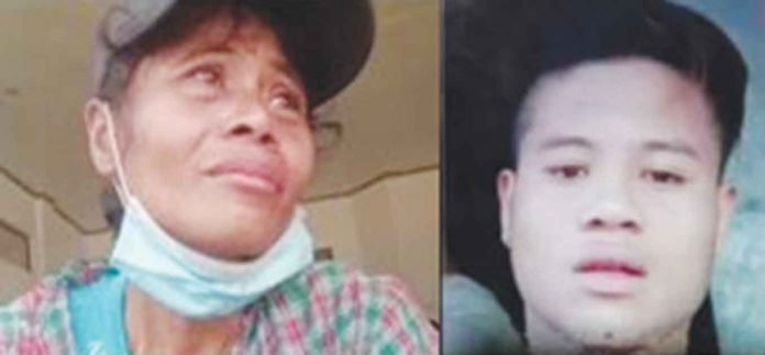 news-ma Rosalita Ariola grieves for her 21-year-old son Anthony who was killed in a clash with government troops in the hinterlands of Barangay Buenavista, Himamaylan City, Negros Occidental on Aug. 10, 2022.