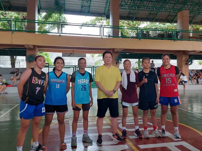 These Negrense female basketball players from TJ7 Basketball Development Center have been recruited by University of Santo Tomas assistant coach Arsenio Dysangco. PHOTO COURTESY OF TATA BELANGEL