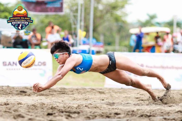 sports-uswag-pic-and-caption Uswag Ilonggo 1’s MJ Ebro dugs the ball during their Beach Volleyball Republic Negros Island Tour match. BVR PHOTO