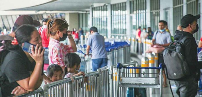 airport Loved ones bid goodbye to departing passengers at the Ninoy Aquino International Airport -Terminal 1 in Pasay City on June 20, 2022. JONATHAN CELLONA/ABS-CBN NEWS
