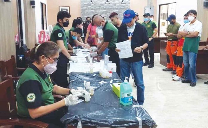 drug-test Employees, including elected municipal officials, of Hamtic municipal government in Antique undergo surprise drug testing on Sept. 16. MUNICIPALITY OF HAMTIC/FB
