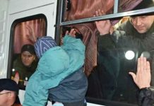 Russia admits mobilisation errors, amid growing public opposition Russian authorities say 300,000 army reservists will be called – but media reports suggest the figure could be much higher. Photo shows a drafted Russian man gesturing goodbye to his family. BBC