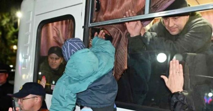 Russian authorities say 300,000 army reservists will be called – but media reports suggest the figure could be much higher. Photo shows a drafted Russian man gesturing goodbye to his family. BBC