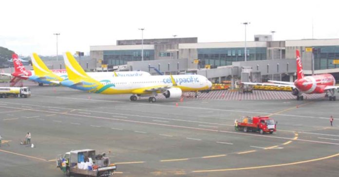 Cebu Pacific says the adjusted fuel surcharges will encourage more people to travel. PNA FILE PHOTO
