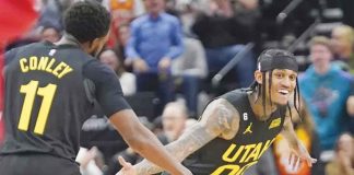 Utah Jazz’s Jordan Clarkson (00) celebrates after making a three-pointer with teammate Mike Conley (11) during the first half of an NBA basketball game against the Houston Rockets Wednesday, Oct. 26, 2022, Salt Lake City. AP PHOTO/RICK BOWMER