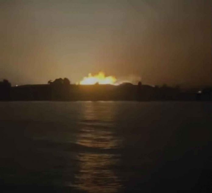 Several individuals at the Bacolod Baywalk area in BREDCO port captured on video the fire (as seen in this photo) at the Reclamation Feeder No. 5 of Central Negros Electric Cooperative in Brgy. 35, Bacolod City early Saturday morning, Oct. 15. The fire caused Panay Island's transmission grid to trip, ultimately causing a blackout. SCREENSHOT FROM SUNSHINE GONZALES AMOR’S VIDEO