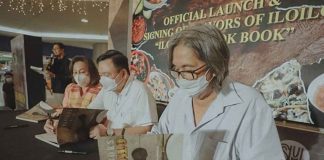 FLAVORS OF ILOILO. (From left) Iloilo City’s first lady Rosalie S. Treñas, Mayor Jerry P. Treñas and Ilonggo heritage cuisine advocate chef Rafael “Tibong” Jardeleza Jr. sign copies of the Ilonggo cookbook “Flavors of Iloilo” during its launching at SM City Iloilo on Oct. 14, 2022. JERRY TREÑAS FACEBOOK PAGE PHOTO