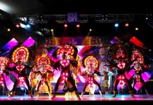 GRANDER, BRIGHTER. Spectators are given a glimpse of the Dinagyang Ilomination, the newest festival event to spice up the face-to-face celebration of Dinagyang 2023. Photo shows the Dinagyang warriors in lighted costumes perform at the start of the 100-day countdown to Dinagyang 2023 at SM City Iloilo on Friday, Oct. 14. ILOILO CITY MAYOR’S OFFICE PHOTO