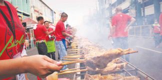 Savor even just by smelling. Not only the activities during Masskara Festival fill the streets of Bacolod City but also smoke coming from rows and rows of charcoal-grilled Bacolod chicken inasal. (PN File Photo)