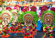 Shorter MassKara this year? Barangay Granada is the grand champion of the 2022 MassKara Festival street and arena dance competition. Photo shows Barangay Granada in their colorful and vibrant costume during yesterday’s street dance competition. ANDREW ALTAREJOS PHOTO