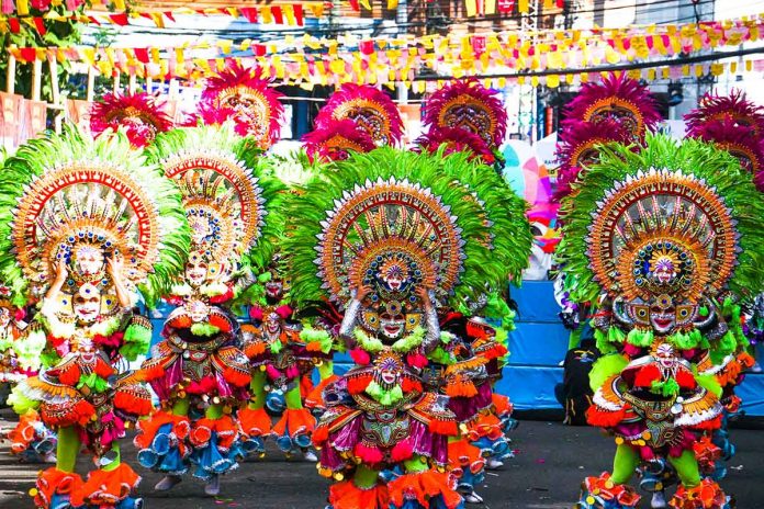 Barangay Granada is the grand champion of the 2022 MassKara Festival street and arena dance competition. Photo shows Barangay Granada in their colorful and vibrant costume during yesterday’s street dance competition. ANDREW ALTAREJOS PHOTO