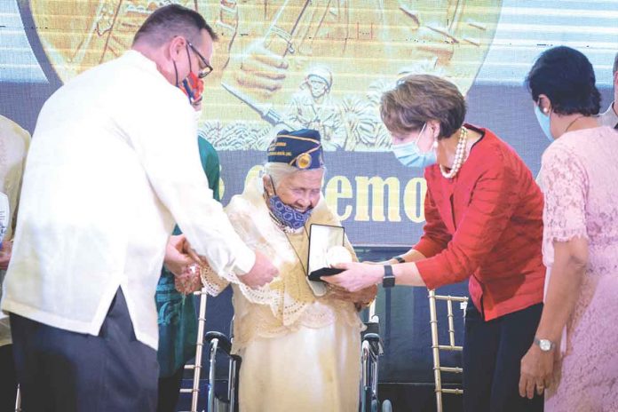 US Ambassador to the Philippines MaryKay Carlson leads the awarding of the Congressional Gold Medal to one of 31 Filipino World War II veterans who received the honor on Oct. 19, 2022 in Palo, Leyte. US EMBASSY PHOTO US Ambassador to the Philippines MaryKay Carlson leads the awarding of the Congressional Gold Medal to one of 31 Filipino World War II veterans who received the honor on Oct. 19, 2022 in Palo, Leyte. US EMBASSY PHOTO