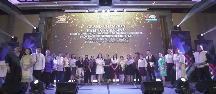negocc-tourism-awards Negros Occidental was awarded champion for Best Tourism Promotion Publication for the book “Halin sa Kusina: Food Stories from the People of Negros Occidental” in this year’s Pearl Awards during the 23rd National Convention of the Association of Tourism Officers of the Philippines (ATOP) in Tagaytay City, Thursday night, Oct. 27. VIDEO GRAB FROM ATOP TAGAYTAY 2022 FACEBOOK LIVE