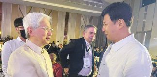 Roxas City mayor Ronnie Dadivas meets Department of Trade and Industry Secretary Alfredo Pascual (left) during the City Business Investors Summit 2022 in Quezon City. RONNIE DADIVAS/FB PHOTO