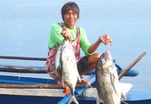 SMPC turns over 40 fiberglass bancas for fishing livelihood CATCH OF THE DAY. Eddie Panganiban is shown here with Semirara Mining and Power Corporation’s fiberglass banca.