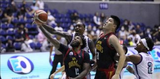 Bay Area Dragons’ Myles Powell has his shot blocked by Converge FiberXers’ Quincy Miller. PBA MEDIA BUREAU