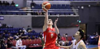 NorthPort Batang Pier’s Robert Bolick Jr. forces a tough layup as Meralco Bolts’ Allein Maliksi looks on. PB MEDIA BUREAU