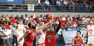 Barangay Ginebra San Miguel Kings’ guard Stanley Pringle swipes the ball from Bay Area Dragons’ 7-foot-5 center Liu Chuanxing. PBA MEDIA BUREAU