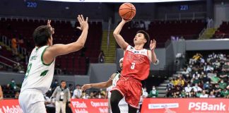 University of the East Red Warriors’ Kyle Paranada attempts a floater against the defense of De La Salle University Green Archers’ Raven Cortez. UAAP MEDIA BUREAU