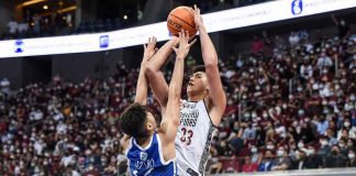 University of the Philippines Fighting Maroons’ Carl Tamayo attempts a tough jumper against the defense of Ateneo de Manila University Blue Eagles’ Josh Lazaro. UAAP MEDIA BUREAU