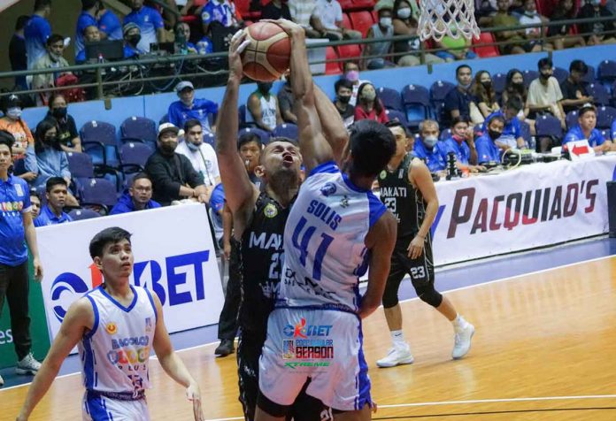 sports-bacolod-pic-and-caption Bacolod BingoPlus’ Jayboy Solis (41) blocks the shot of Makati City MNL Kingpin’s Joseph Lingao Lingao (21) during their 2022 Maharlika Pilipinas Basketball League game. MPBL PHOTO