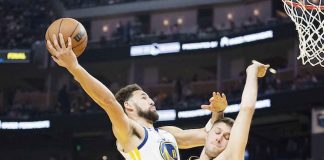 Golden State Warriors’ Klay Thompson soars for a layup against the defense of Los Angeles Lakers’ Matt Ryan. LAKERS NATION PHOTO