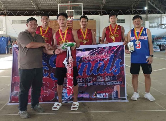 sports-san-agustin-pic-and-caption University of San Agustin-Iloilo’s Franc Steven Tono receives his Under-23 category MVP medal from NBTC Region 6 head Richard Gabayoyo. PHOTO COURTESY OF JOPHIL CERCADO