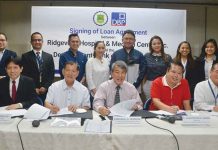 DBP lends P500-M for pioneering hospital in Cavite town Photo shows Development Bank of the Philippines (DBP) President and Chief Executive Officer Emmanuel Herbosa (seated, third from left) with other key officials of DBP and Ridgeview Hospital and Medical Center, Inc. (RHMCI) during the signing of the memorandum of agreement between the two institutions. Seated from left are DBP Senior Vice President Daniel Gonzales; RHMCI president, Fr. Arturo Joseph Balagat; RHMCI chairman, Dr. Christopher Cabida; and DBP Executive Vice President Paul Lazaro. Standing from left are Russel Lance Ragudo of DBP; DBP Assistant Vice President Brian Niño Juniller; Dr. Jerome Idea, Dr. Jenny Lynn Idea, Dr. Cipriano Delos Reyes, and Caroline Cabida of RHMCI; and Mgr. Ana Patricia Gaviola and Christine Allaine Saporsantos of DBP.