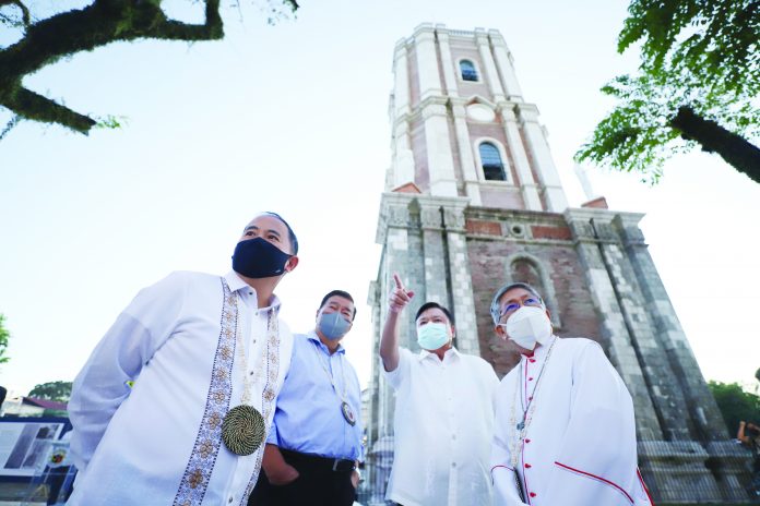 belfry The historic Jaro Belfry’s carillon bells were heard ringing again. (From left) National Historical Commission of the Philippines (NHCP) chairperson Rene Escalante, former senator Franklin Drilon, Mayor Jerry Treñas, and Jaro Archbishop Jose Romeo Lazo during the turnover of the newly restored Jaro Belfry to the Iloilo City government and the Archdiocese of Jaro on Sunday, Nov. 27. ILOILO CITY MAYOR’S OFFICE PHOTO