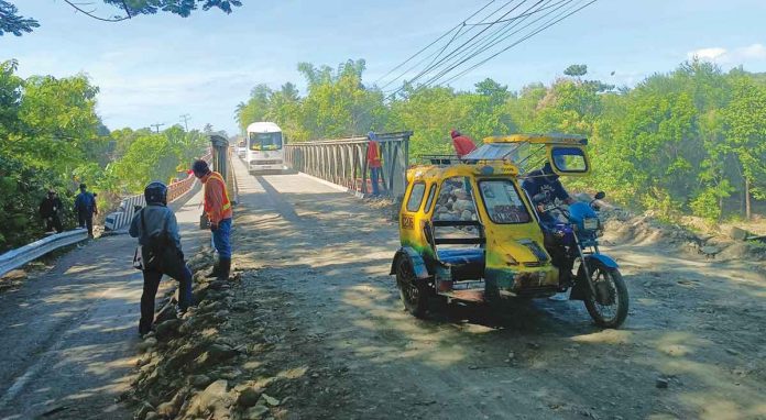 bridge For the public’s safety, only a maximum of 10 tons at a time can cross the Bailey bridge in Barangay Oyungan, Miag-ao, Iloilo, according to Mayor Richard Garin. AJ PALCULLO/PN