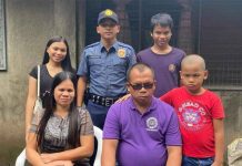 Photo shows the 24-year-old patrolman, Val Liansing, with his family members who are all visually impaired. Liansing died on Sunday, Oct. 30, after he accidentally shot himself in their house in Barangay Mansilingan, Bacolod City. DSWD PHOTO