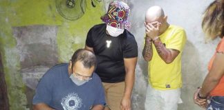 Drug suspects Regina Escosio and Alvin Cristales (first and second from right, respectively) yielded 1,250 grams of shabu worth P8.5 million during a buy-bust operation in Purok Bolinao, Barangay 1, Bacolod City on Oct. 13, 2022. PRO-6 PHOTO