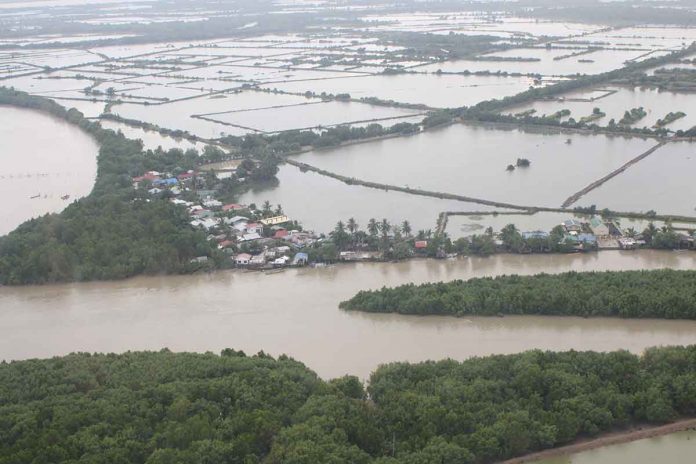 flood A total of 149 barangays in Capiz got flooded due to Tropical Storm “Paeng”, according to the Regional Disaster Risk Reduction and Management Council (RDRRMC) - Emergency Operations Center. Aerial photo shows the flooded areas in Capiz as of Sunday morning, Oct. 30. RDRRMC VI-PIA VI PHOTO