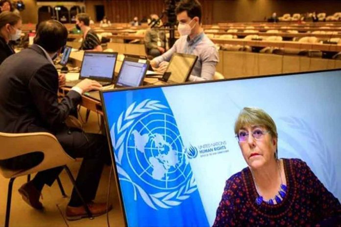 nation3-un-human-rights-council United Nations High Commissioner for Human Rights Michelle Bachelet is seen on a screen delivering a speech remotely at a UN Human Rights Council. This photo was taken on May 27, 2021. FILE PHOTO BY FABRICE COFFRINI / AGENCE FRANCE-PRESSE