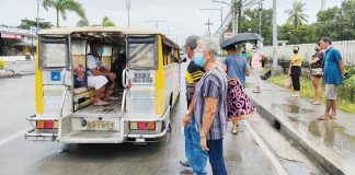 Photo shows passengers waiting for provincial jeepneys in front of the Ungka Terminal in Brgy. Ungka, Jaro, Iloilo City. Under the Local Public Transport Route Plan, provincial jeepneys are prohibited from entering the city. ARNEL JOHN PALCULLO/PN