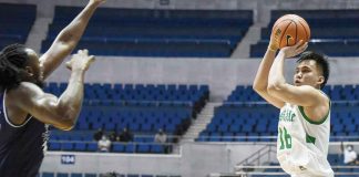 Cyrus Austria scored the game-winning triple for De La Salle University Green Archers while being defended by Adamson University Falcons' Lenda Douanga. UAAP PHOTO