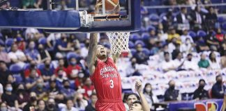 Barangay Ginebra San Miguel Kings’ Jamie Malonzo skies for a two-handed dunk as Blackwater Bossing's Renato Ular looks on. PBA PHOTO
