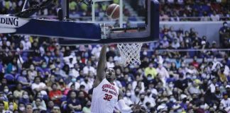 Barangay Ginebra San Miguel Kings’ Justin Brownlee goes for a one-hander as TNT Tropang Giga’s Kelly Williams and John Paul Erram look on. PBA PHOTO