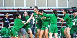 Members of De La Salle University Lady Archers celebrate following their victory over National University Lady Bulldogs. UAAP PHOTO