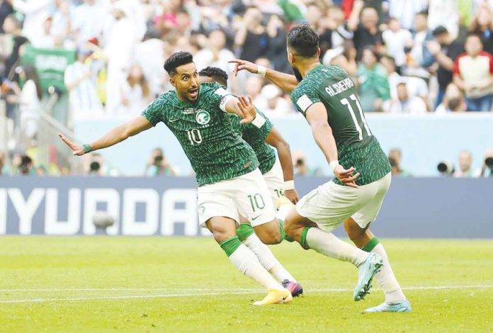 sports-World-Cup Salem Al-Dawsari celebrates after scoring Saudi Arabia's second goal. CLIVE BRUNSKILL/GETTY IMAGES