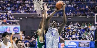 Ateneo de Manila University Blue Eagles’ Angelo Kouame attempts an inside shot against the defense of De La Salle University Green Archers’ Michael Phillips. UAAP PHOTO