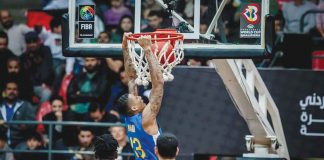 Gilas Pilipinas’ Jamie Malonzo pulls up a two-handed dunk after evading the defense of Jordan. FIBA PHOTO