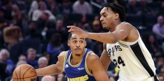 Golden State Warriors’ Jordan Poole drives on San Antonio Spurs’ Devin Vassell during their NBA game at Chase Center in San Francisco, California. SCOTT STRAZZANTE / THE CHRONICLE PHOTO