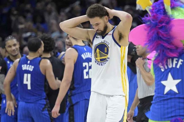 sports-orlando Golden State Warriors' Klay Thompson reacts after missing a last-second basket at the end of an NBA basketball game against the Orlando Magic. AP PHOTO/PHELAN M. EBENHACK