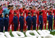 Iran World Cup players decline to sing nat’l anthem Iran players stand in silence as their national anthem play at the Khalifa International Stadium in Doha, Qatar. BBC